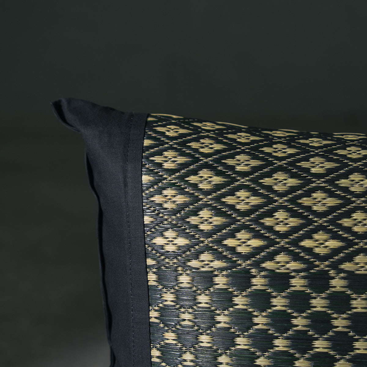 An igusa tatami pillow in black Edo Komon