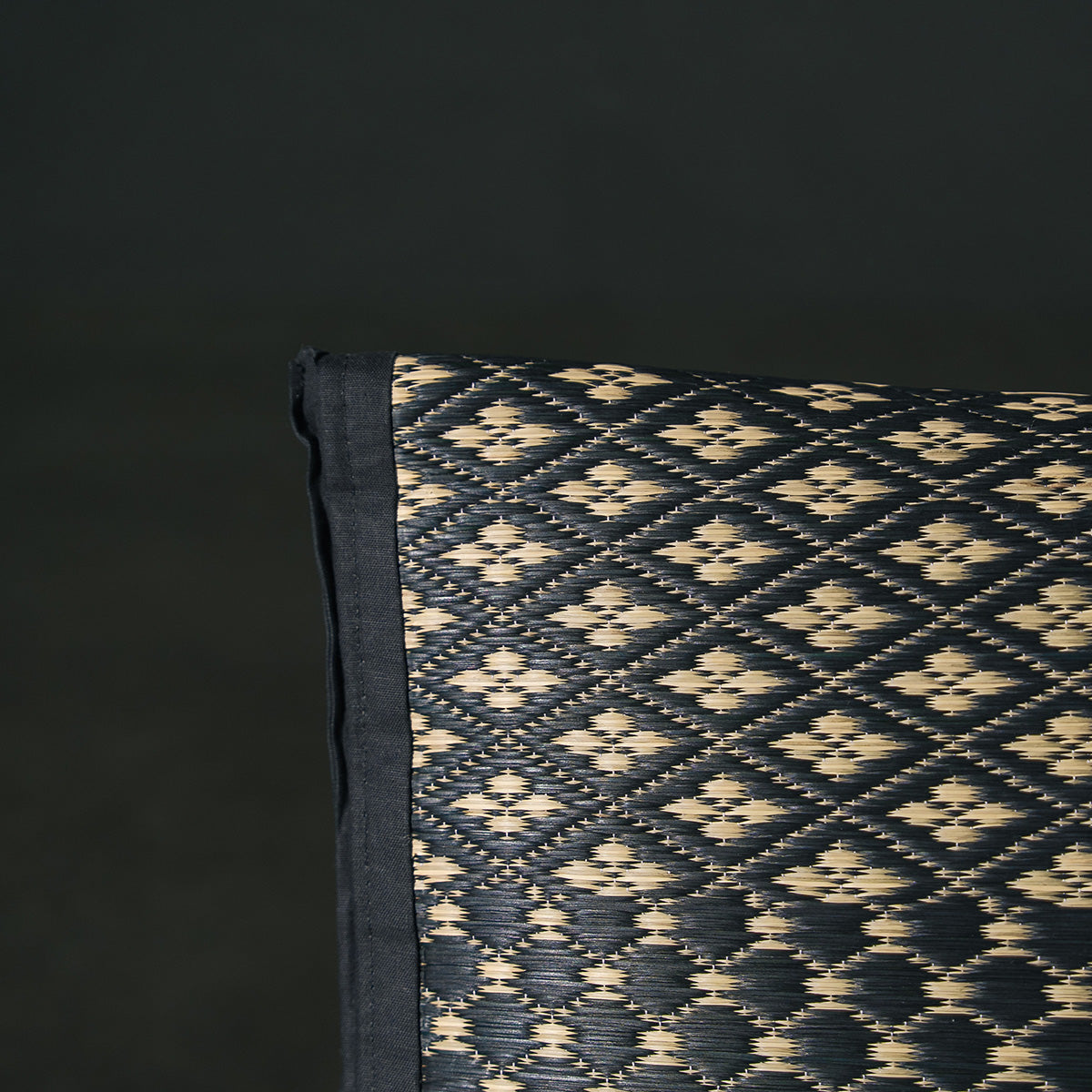 An igusa tatami pillow in black Edo Komon