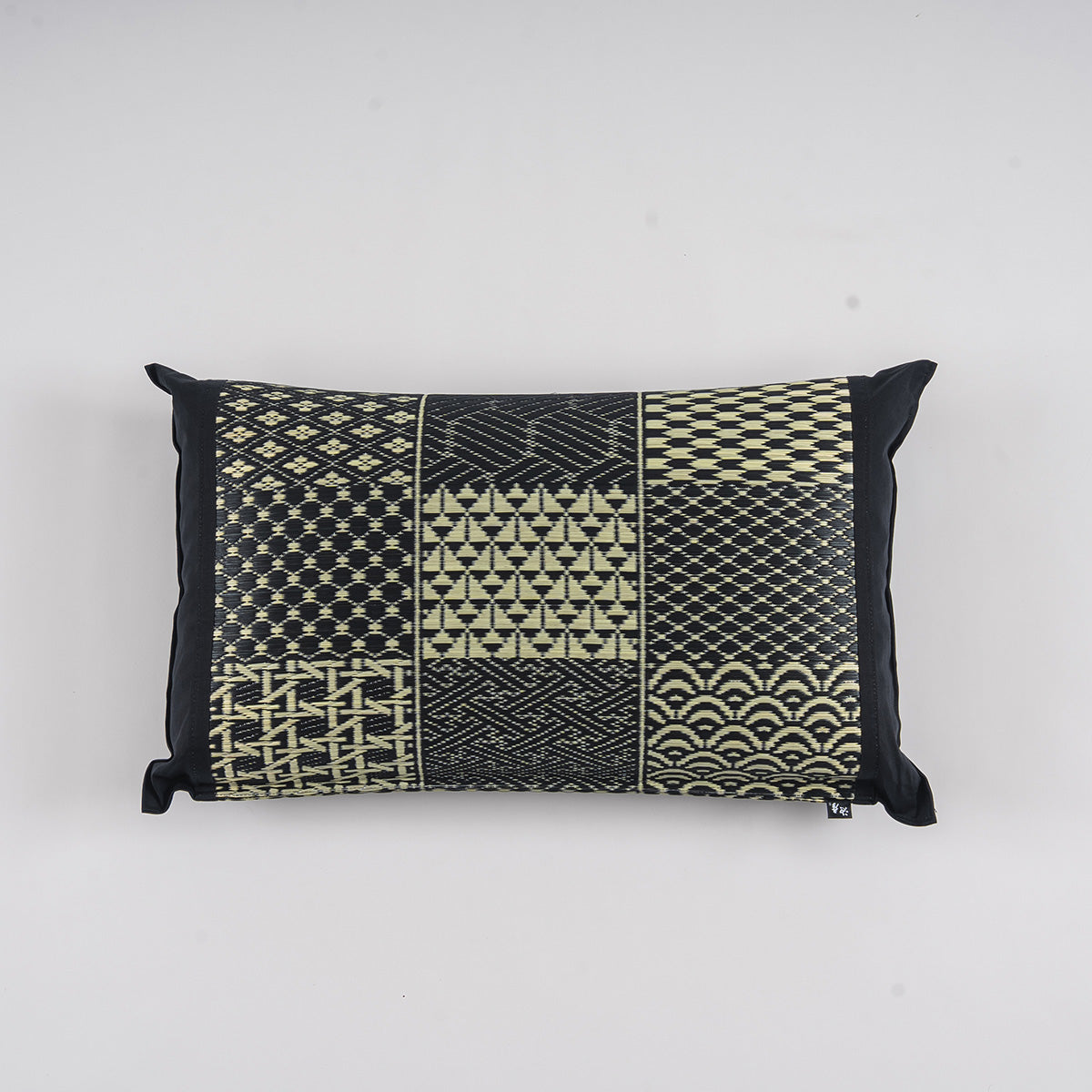 An igusa tatami pillow in black Edo Komon 