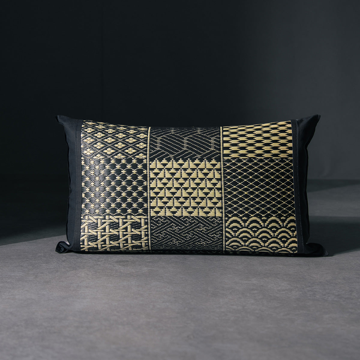 An igusa tatami pillow in black Edo Komon 